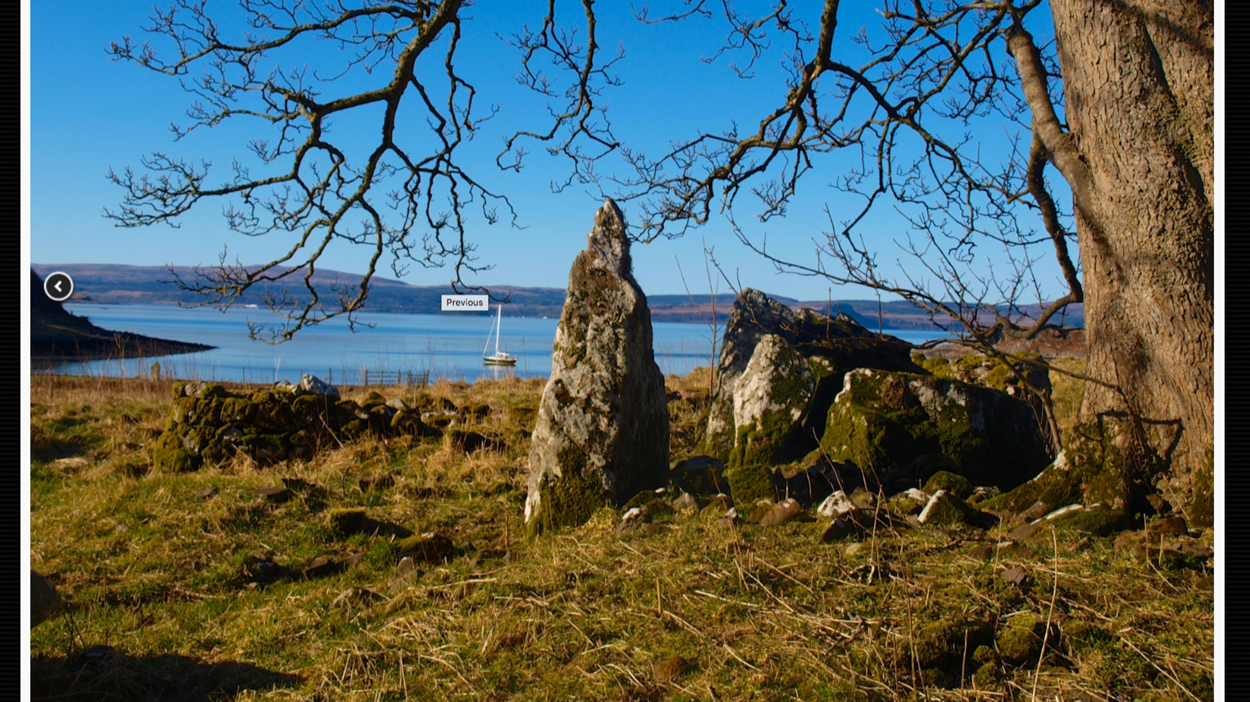 The remains of a chambered cairn